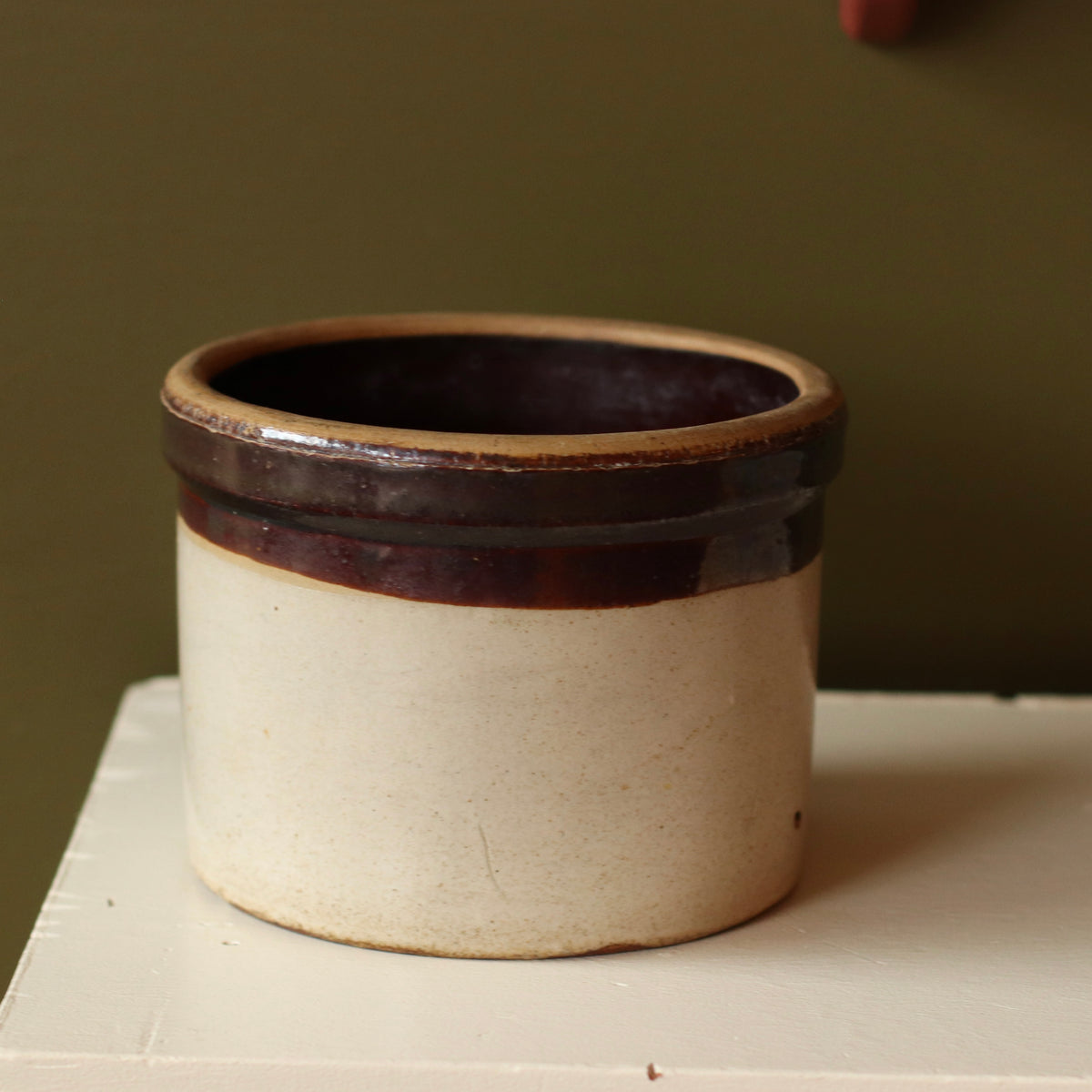 Dark Rimmed Primitive Crock