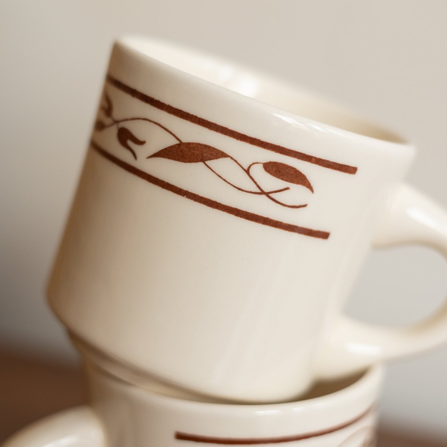 Pair of Cream Coffee Mugs with Patterned Rim