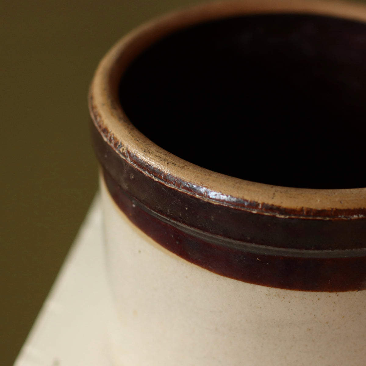 Dark Rimmed Primitive Crock