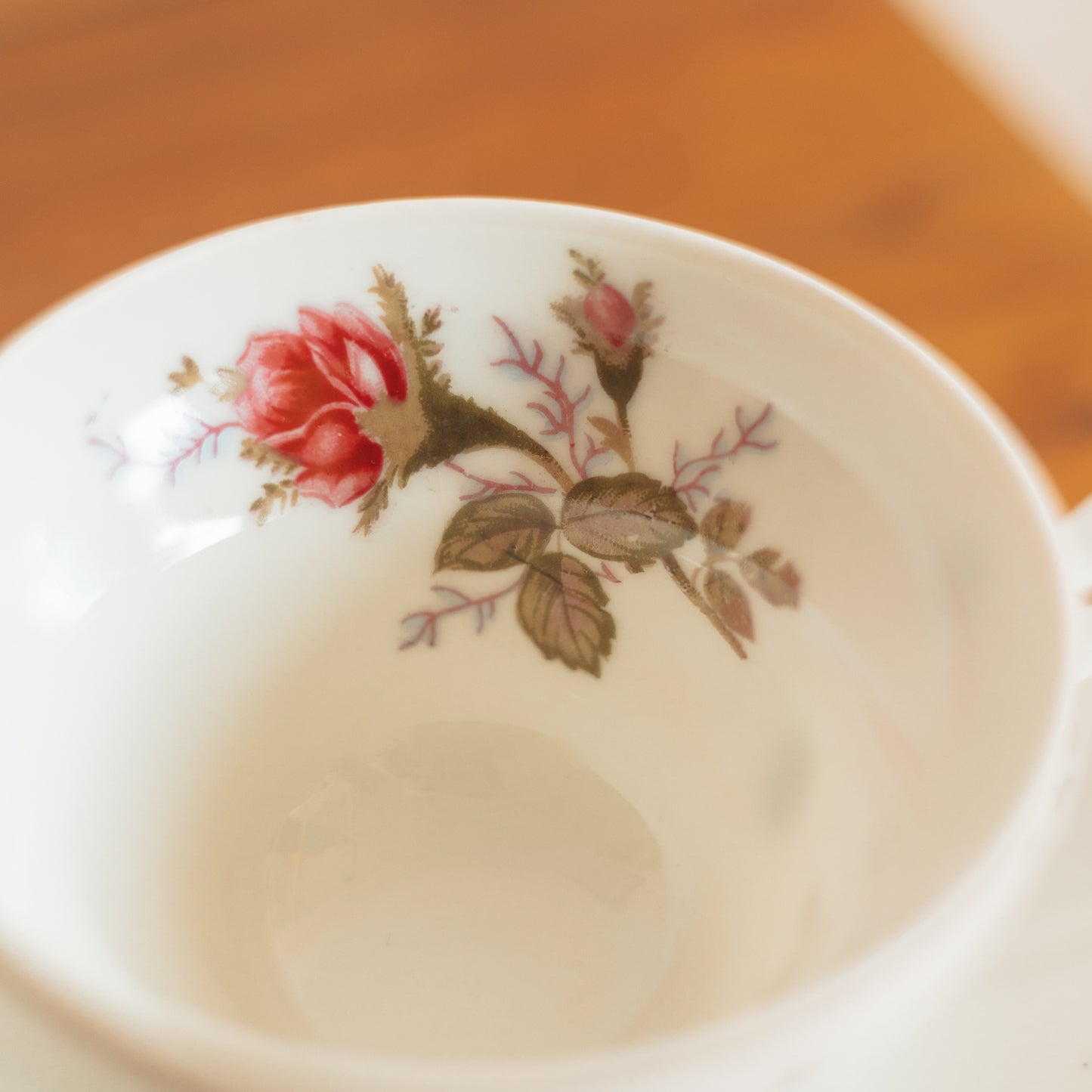 Vintage Teacup and Saucer with Rose Pattern
