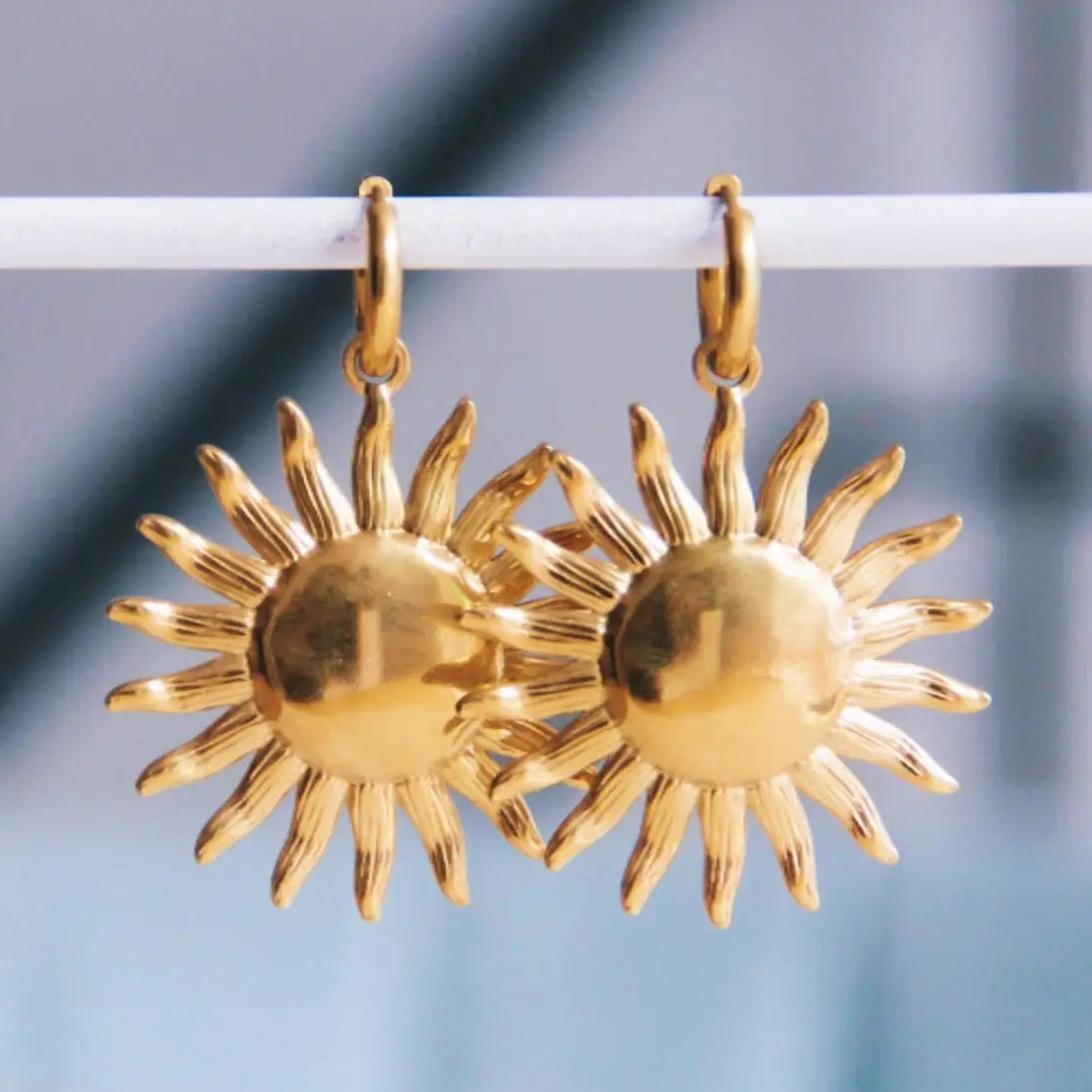 Bazou | Hoop Earring with Extra Large Sun Charm