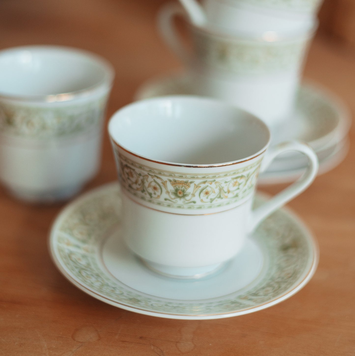 Teacup and Saucer with Green Pattern and Gold Detail, Japan