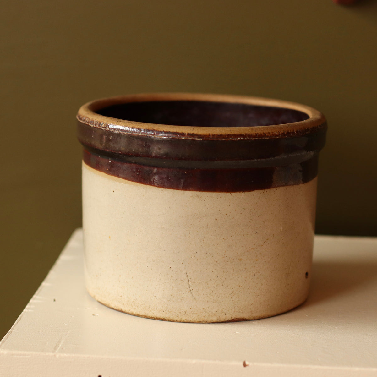Dark Rimmed Primitive Crock