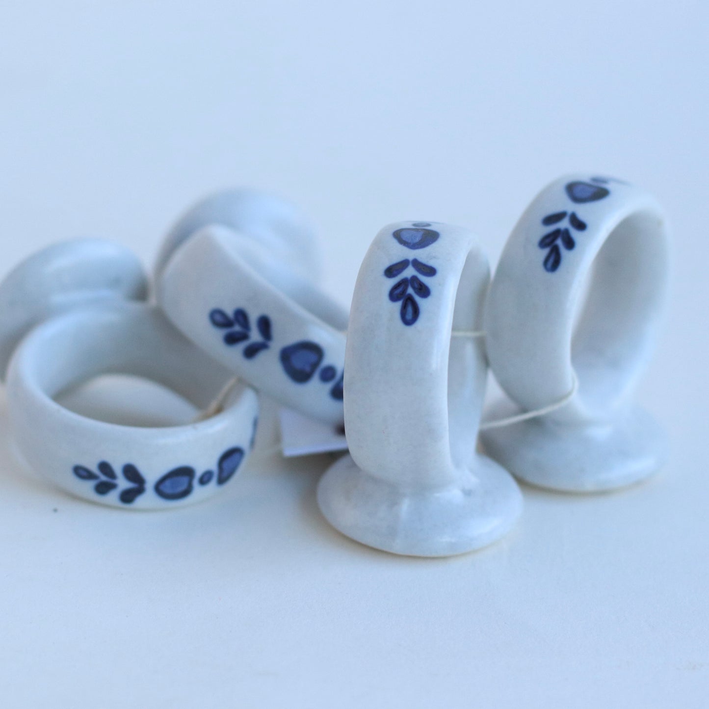 White Ceramic Napkin Rings with Blue Country Motif, set of 4