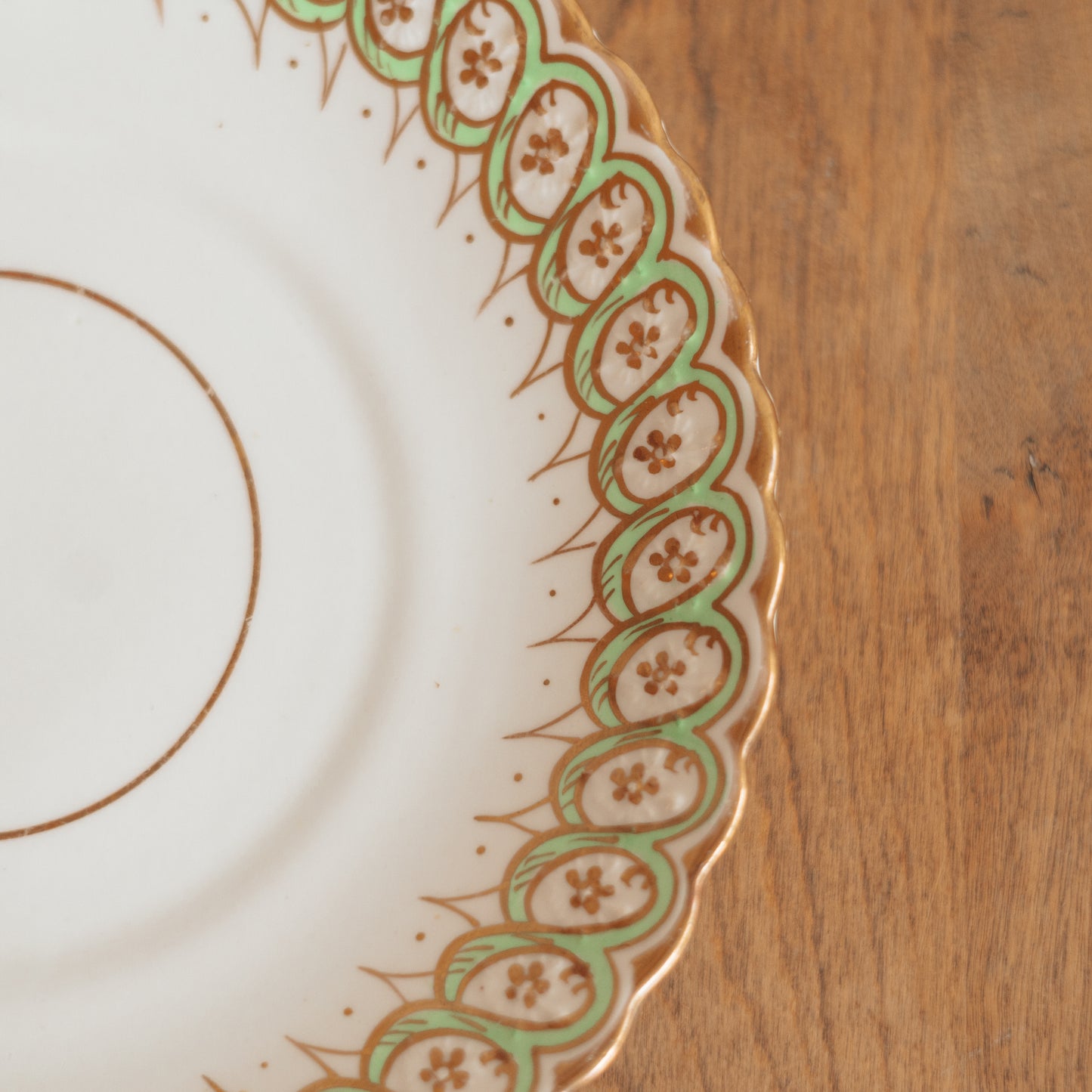 Decorative Plate with Handpainted Green and Gold Rim