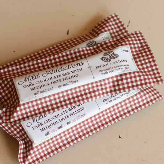 Mild Addiction | Dark Chocolate Bar, Pecan & Medjool Date Center