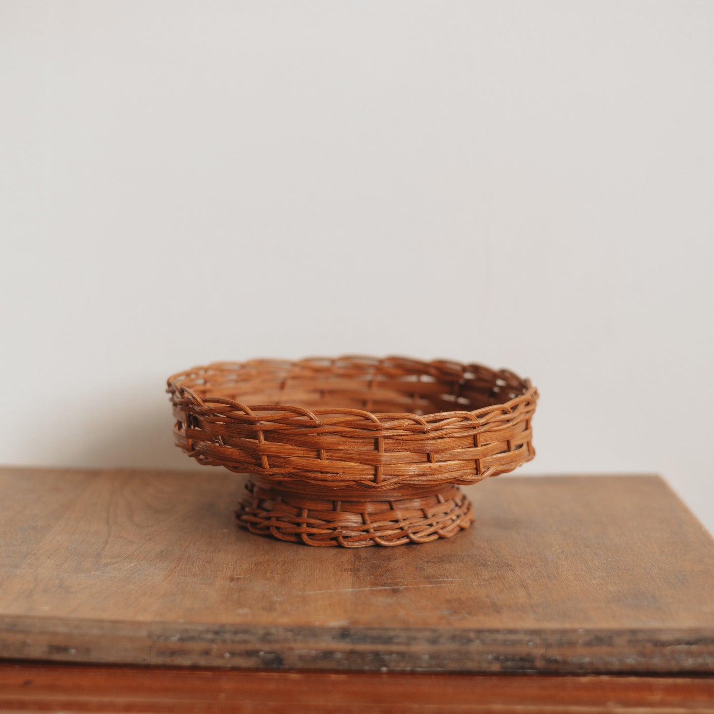 Wicker Pedestal Bowl With Wooden Bottom
