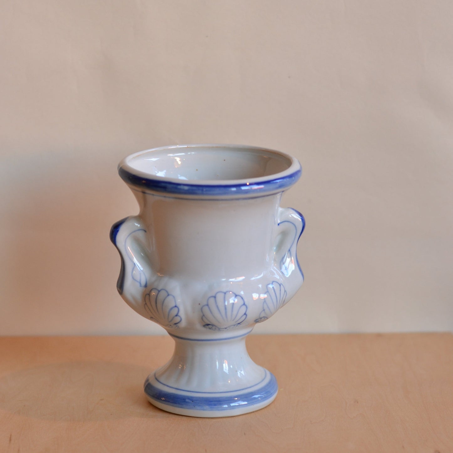 Footed Ceramic Vase with Shell Decoration