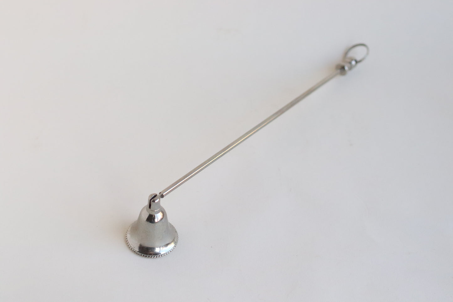 silver vintage candle snuffer